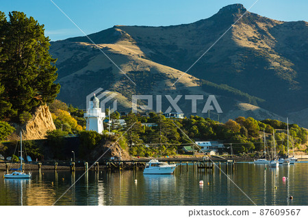 Scenery of Akaroa Lighthouse and Akaroa Bay, a town located on the Banks Peninsula on the South Island of New Zealand 87609567