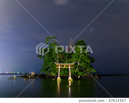 Torii and starry sky in the sea Torii and starry sky in the sea 87614367