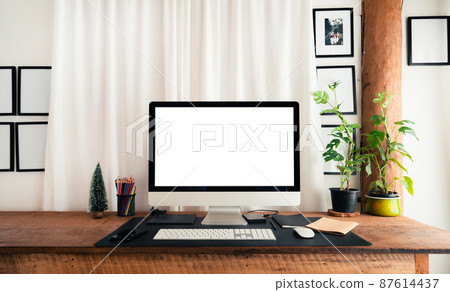 home office desk,Computer screen on a wooden table in the house home office desk,Computer screen on a wooden table in the house 87614437