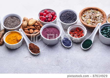 Various superfoods and healthy food supplement. 87614929