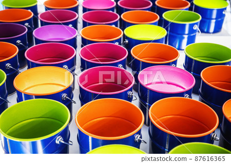 metal cans with multicolored paint. Background metal cans with multicolored paint. Background 87616365