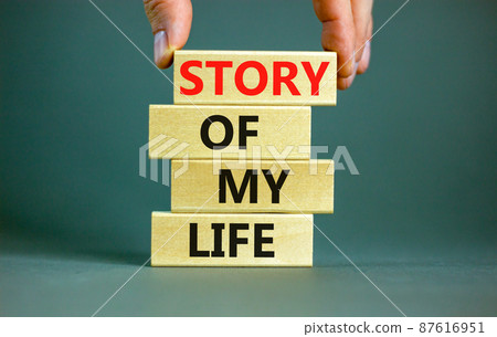 Story of my life and storytelling symbol. Concept words Story of my life on wooden blocks. Businessman hand. Beautiful grey table grey background. Story of my life business concept. Copy space. Story of my life and storytelling symbol. Concept words Story of my life on wooden blocks. Businessman hand. Beautiful grey table grey background. Story of my life business concept. Copy space. 87616951