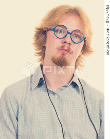 Funny looking young adult guy 87617462