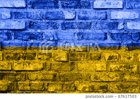 Ukraine flag paint on old grunge brick wall, background texture Ukraine flag paint on old grunge brick wall, background texture 87617503
