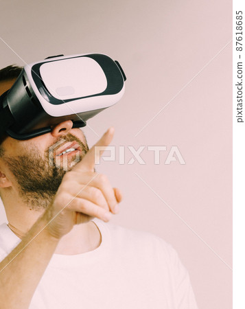 Adult man wearing vr goggles 87618685