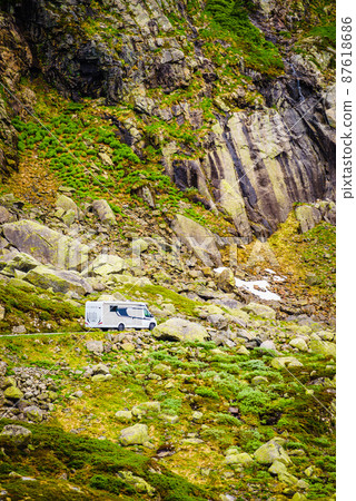 Camper car in norwegian mountains 87618686