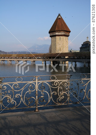 Historic Water Tower of the famous timber bridge in Lucerne, the Chapel Bridge. 87621308