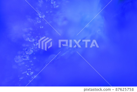 Water drops on blue background Water drops on blue background 87625758