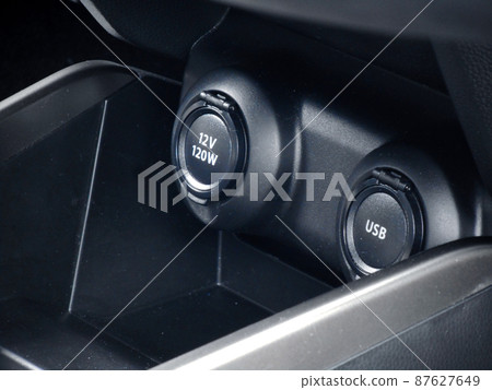 Center console smartphone storage and charging port 87627649