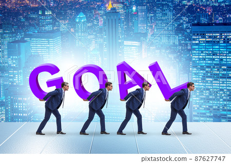 Businessman in goal concept carrying letters Businessman in goal concept carrying letters 87627747