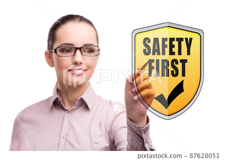 Safety first concept with businesswoman Safety first concept with businesswoman 87628051