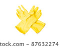 Yellow rubber gloves on a white background. concept of cleaning 87632274