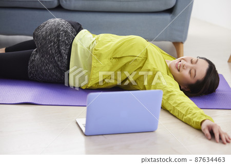 Woman fitness at home Woman fitness at home 87634463