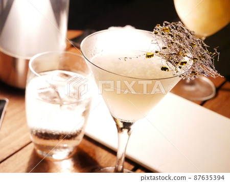 White cocktail outdoor bar night lights 87635394