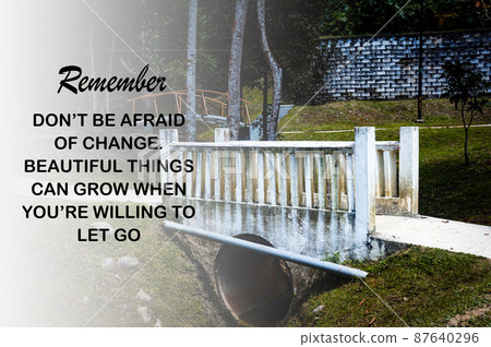 Motivational and Inspirational quote - Don't be afraid of change. Beautiful things can grow when you're willing to let go. With blurred bridge background. Motivational concept Motivational and Inspirational quote - Don't be afraid of change. Beautiful things can grow when you're willing to let go. With blurred bridge background. Motivational concept 87640296