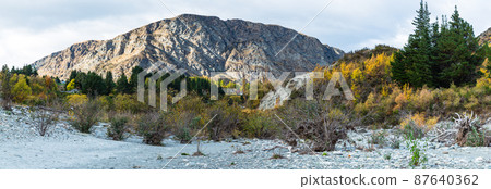 The scenery and autumn colors of the Arthur's Point valley near Queenstown in the Otago region of New Zealand The scenery and autumn colors of the Arthur's Point valley near Queenstown in the Otago region of New Zealand 87640362
