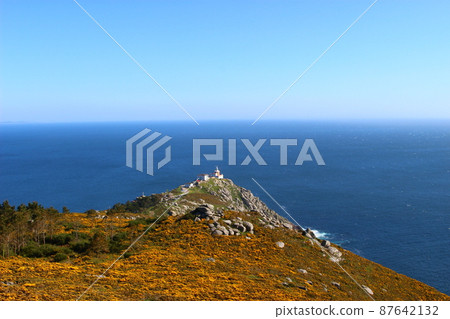 Cape Finisterre, the terminal point of Camino (pilgrimage to Santiago), the lighthouse at the western end of Spain Cape Finisterre, the terminal point of Camino (pilgrimage to Santiago), the lighthouse at the western end of Spain 87642132