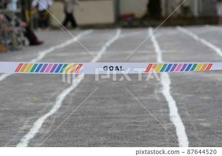 Goal tape that is the target of the athletic meet's foot race Goal tape that is the target of the athletic meet's foot race 87644520