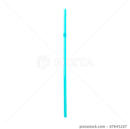 Blue cocktail tube with the possibility of bending isolated on a white background. Blue cocktail tube with the possibility of bending isolated on a white background. 87645287