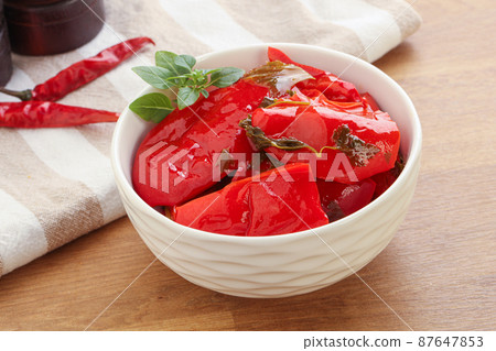 Marinated red bell pepper with oil 87647853