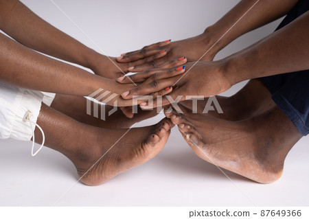 Close up African American man and woman hand touching holding together isolated on white background for love and healing concept 87649366