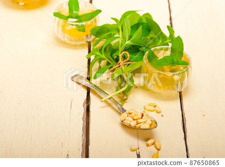 Arab traditional mint and pine nuts tea Arab traditional mint and pine nuts tea 87650865