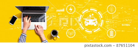 EV concept with person using laptop EV concept with person using laptop 87651104