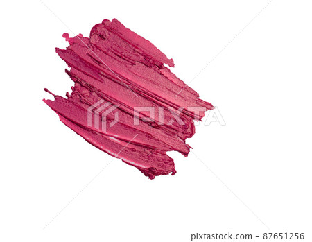 Smear of red, scarlet, lipstick on a white background Smear of red, scarlet, lipstick on a white background 87651256