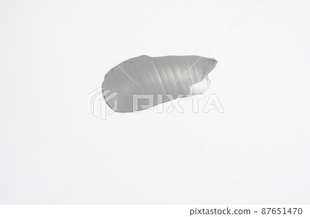 Clay mud mask with Dead Sea minerals. Texture. smear of scrub with clay on a white background. 87651470