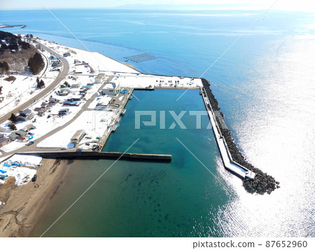 Aerial view of Satsukari fishing port in Kikonai-cho, Hokkaido in early spring 87652960