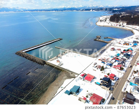 Aerial view of Izumisawa fishing port in Kikonai-cho, Hokkaido in early spring Aerial view of Izumisawa fishing port in Kikonai-cho, Hokkaido in early spring 87653023