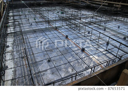 Solid foundation of a newly built single-family house with completed reinforcement 87653571