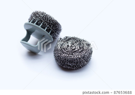Steel wool dish washing, Metal sponge on white background. 87653688