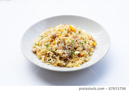 Fried rice in white plate on white background. 87653706