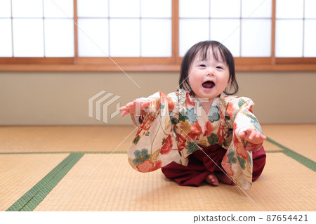 A baby wearing a hakama in a Japanese-style room A baby wearing a hakama in a Japanese-style room 87654421