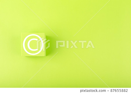 Minimal copyright and intellectual property protection concept on bright green background with copy space Minimal copyright and intellectual property protection concept on bright green background with copy space 87655882