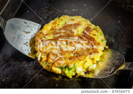 Japanese traditional ozonomiyaki Japanese Traditional Pizza Okonomiyaki 87656075