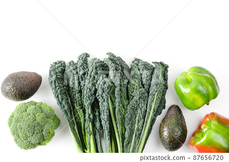 Raw healthy food clean eating vegetables source of protein for vegetarians: broccoli, bellpepper, kale, tomato, avocado. Fresh colorful organic vegetables captured from above, top view Raw healthy food clean eating vegetables source of protein for vegetarians: broccoli, bellpepper, kale, tomato, avocado. Fresh colorful organic vegetables captured from above, top view 87656720