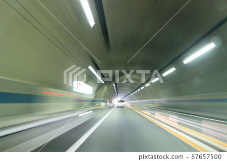 Highway tunnel driving Highway tunnel driving 87657500