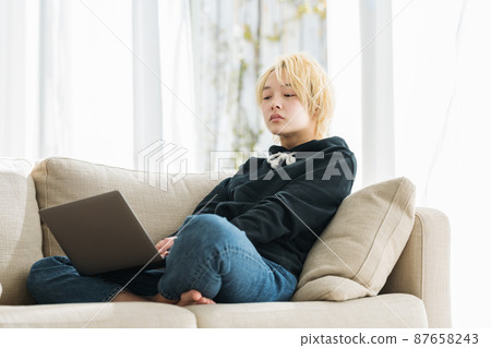 Gen Z women enjoying the internet at home 87658243