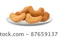cashew nut isolated in white plate on white background 87659137