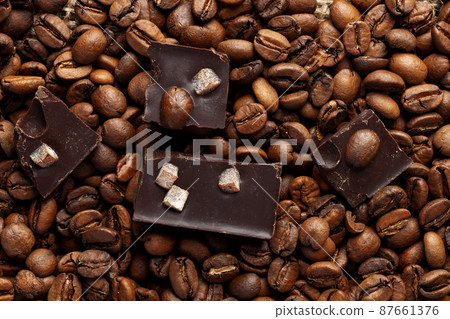 roasted coffee beans with black chocolate roasted coffee beans with black chocolate 87661376