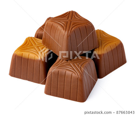 Chocolate sweets on a white background 87663843