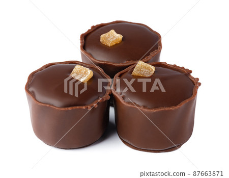 Chocolate sweets on a white background Chocolate sweets on a white background 87663871