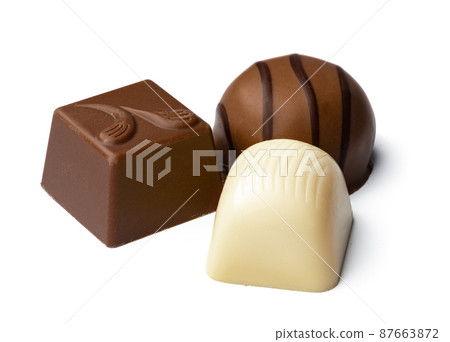 Chocolate sweets on a white background Chocolate sweets on a white background 87663872