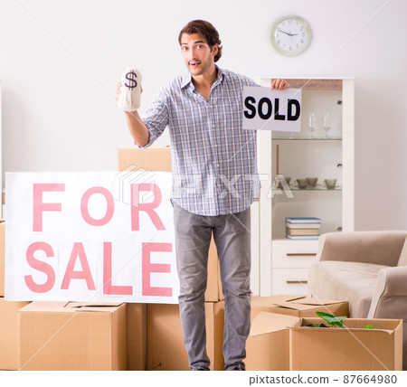 Young man offering home for sale and moving out Young man offering home for sale and moving out 87664980
