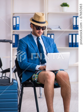 Young employee escaping for summer vacation Young employee escaping for summer vacation 87665063