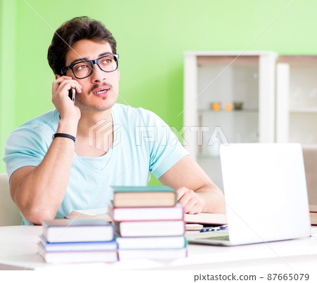 Student preparing for university exams at home 87665079