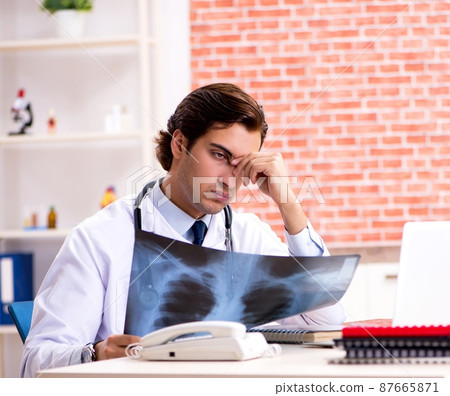 The young doctor working in hospital 87665871