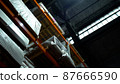 Retail Warehouse full of Shelves with Goods in Cardboard Boxes. Modern industrial warehouse interior. Logistic distribution industrial interior room. 87666590